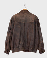 Revive the '80s look with this vintage brown used look leather jacket! It's been around the block, but there's still plenty of life in it enough to make a statement that'll stand the test of time. Please keep in mind, that the inner lining of the leather jacket is full of discoloration and cracks that have been sewn up (condition 4/10 for the inner lining). Please have a look at the last 3 photos for the inner lining.