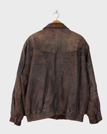 Revive the '80s look with this vintage brown used look leather jacket! It's been around the block, but there's still plenty of life in it enough to make a statement that'll stand the test of time. Please keep in mind, that the inner lining of the leather jacket is full of discoloration and cracks that have been sewn up (condition 4/10 for the inner lining). Please have a look at the last 3 photos for the inner lining.