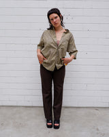 Say less. An original 70s piece from Italy with brown and purple paisley and a relaxed cut made to move. Vintage that speaks for itself. Worn with confidence.