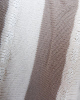 Upgrade your sweater game with this Vintage 80s brown and white striped sweater. Made for both style and comfort, this thin sweater is perfect for any occasion. Don't settle for boring sweaters.
