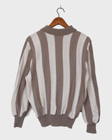 Upgrade your sweater game with this Vintage 80s brown and white striped sweater. Made for both style and comfort, this thin sweater is perfect for any occasion. Don't settle for boring sweaters.