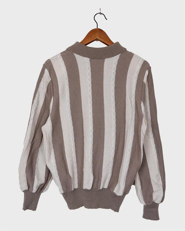 Upgrade your sweater game with this Vintage 80s brown and white striped sweater. Made for both style and comfort, this thin sweater is perfect for any occasion. Don't settle for boring sweaters.