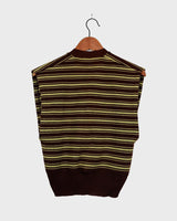 This vintage piece is sure to be a hit! Get out of the ordinary and jump into the ‘90s with this vintage brown vest - fun green stripes make it a true stand-out. It's an old-school classic with an updated twist! Please keep in mind, that this vest has some stains and flaws (last photos)