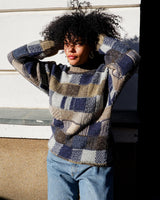 Get the best of all worlds with this vintage 90s Italian sweater. It's made of the finest materials, like silk, alpaca, lana, and mohair! And with an extra-long fit, you can make sure you stay comfy all at the same time