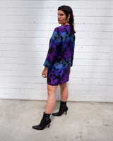 Vintage 80s, floral and fearless. Wear it open as a coat or buttoned up as a dress – either way, it’s a look. Statement gold buttons, bold print, and zero effort. For those who don’t just wear vintage – they own it.