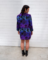 Vintage 80s, floral and fearless. Wear it open as a coat or buttoned up as a dress – either way, it’s a look. Statement gold buttons, bold print, and zero effort. For those who don’t just wear vintage – they own it.