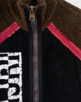 Stay snug with this Premium true vintage 90s Napapijri sherpa vest in a classic brown and black! Keep cozy and don't sleep on this vest. Please keep in mind, that this vest from this high quality brand has some pilling (last photos).