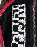 Stay snug with this Premium true vintage 90s Napapijri sherpa vest in a classic brown and black! Keep cozy and don't sleep on this vest. Please keep in mind, that this vest from this high quality brand has some pilling (last photos).
