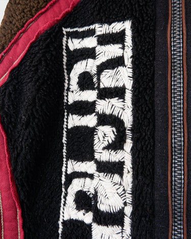 Stay snug with this Premium true vintage 90s Napapijri sherpa vest in a classic brown and black! Keep cozy and don't sleep on this vest. Please keep in mind, that this vest from this high quality brand has some pilling (last photos).