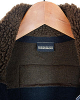 Stay snug with this Premium true vintage 90s Napapijri sherpa vest in a classic brown and black! Keep cozy and don't sleep on this vest. Please keep in mind, that this vest from this high quality brand has some pilling (last photos).