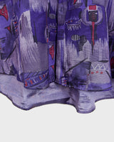 Bold, breezy, and silky smooth - this rare 90s short-sleeve gem by T. Corner is made from real Thai silk, brought to you by one of Thailand’s most renowned silk producers. The glossy fabric pops with a crazy pattern in electric purples and blues that’s impossible to ignore. Wear it loud, wear it proud!