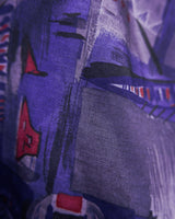 Bold, breezy, and silky smooth - this rare 90s short-sleeve gem by T. Corner is made from real Thai silk, brought to you by one of Thailand’s most renowned silk producers. The glossy fabric pops with a crazy pattern in electric purples and blues that’s impossible to ignore. Wear it loud, wear it proud!