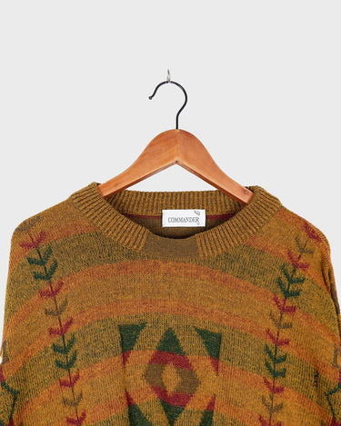 This vintage sweater has fall vibes written all over it, thanks to its alpaca and lambs wool mix in a cozy brown, mustard-yellow combo!