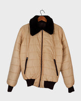 This '70s Vintage jacket is a reversible stunner, featuring a beige / brown flipside and a cozy faux fur collar. Throw it on for confidence look twice as nice - with half the effort!