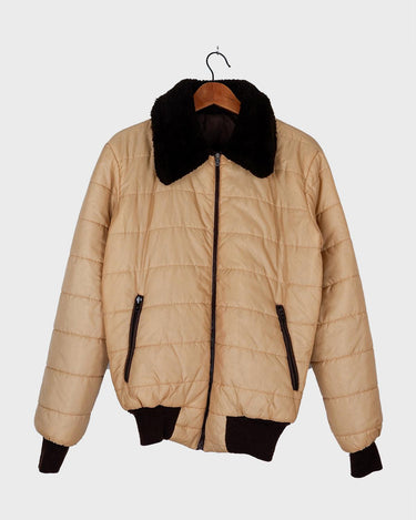 This '70s Vintage jacket is a reversible stunner, featuring a beige / brown flipside and a cozy faux fur collar. Throw it on for confidence look twice as nice - with half the effort!