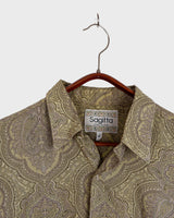 Say less. An original 70s piece from Italy with brown and purple paisley and a relaxed cut made to move. Vintage that speaks for itself. Worn with confidence.