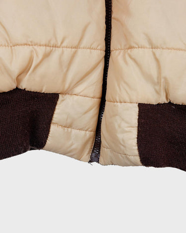 This '70s Vintage jacket is a reversible stunner, featuring a beige / brown flipside and a cozy faux fur collar. Throw it on for confidence look twice as nice - with half the effort!