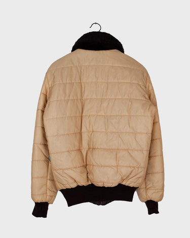 This '70s Vintage jacket is a reversible stunner, featuring a beige / brown flipside and a cozy faux fur collar. Throw it on for confidence look twice as nice - with half the effort!