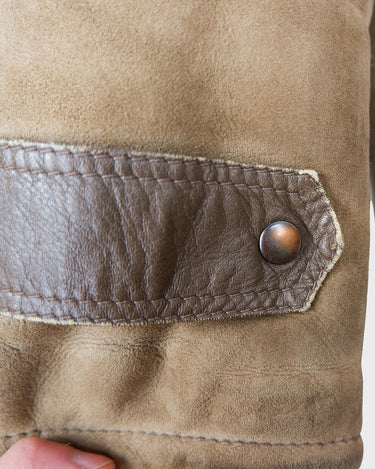 Dip into the vintage look with this super-cozy shearling coat! This classic brown beauty is made for keeping you warm on the chilliest of days. Now you can look as warm as you feel!