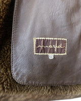 Dip into the vintage look with this super-cozy shearling coat! This classic brown beauty is made for keeping you warm on the chilliest of days. Now you can look as warm as you feel!
