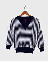 Sail off in style with this vintage 90s sailing sweater (very thin fabric)! Featuring navy blue stripes and a lightweight design, this sweater is perfect for a spring day. Get ready to sail in style!