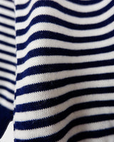 Sail off in style with this vintage 90s sailing sweater (very thin fabric)! Featuring navy blue stripes and a lightweight design, this sweater is perfect for a spring day. Get ready to sail in style!