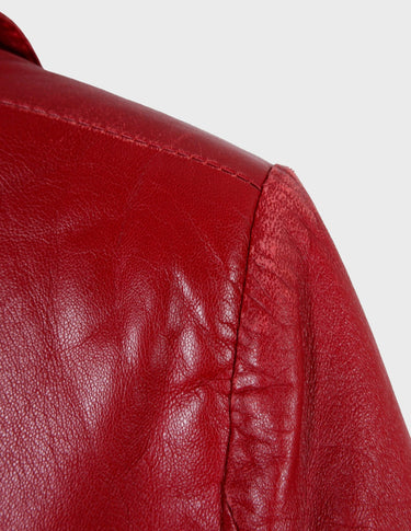 Be bold and rebellious with this Premium red 80s leather jacket. Its intense color and light shoulder pads will turn heads and make a fashion statement wherever you go. Add some attitude and style to your wardrobe today! Please keep in mind that this jacket has more stains and flaws around the shoulder area - last photos.