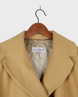 This Premium Vintage 80s coat is the perfect cosy companion! Crafted from a luxe yellow cashmere-wool blend that’ll keep you warm on the chilliest days, while its two rows of buttons and oversized fit flatter any figure. Bring the 80s back into your wardrobe. Fab with a side of funk!
