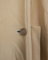 This Premium Vintage 80s coat is the perfect cosy companion! Crafted from a luxe yellow cashmere-wool blend that’ll keep you warm on the chilliest days, while its two rows of buttons and oversized fit flatter any figure. Bring the 80s back into your wardrobe. Fab with a side of funk!