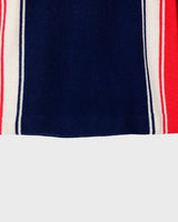 Look snazzy in this navy blue and red color mix Lacoste sweater! This longer fit (length: 66cm) is perfect for keeping you warm and looking snazzy.