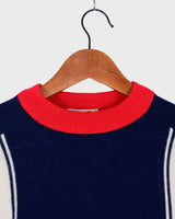 Look snazzy in this navy blue and red color mix Lacoste sweater! This longer fit (length: 66cm) is perfect for keeping you warm and looking snazzy.