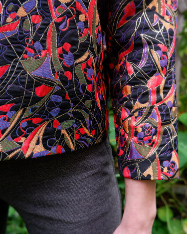 Time to sparkle in this vintage 80s handmade spring jacket (super thin) that shines! With a rainbow of colors and shimmering accents, this lightweight jacket will bring a special touch to your outfit.
