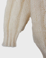 Slip into this cozy Premium Vintage 90s mohair superkid mix cable knit cardigan! Soft, furry and light transparent with a unique twist on a classic style, this cardigan is a must-have for any cable knit lovers!