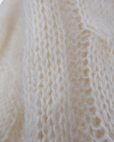 Slip into this cozy Premium Vintage 90s mohair superkid mix cable knit cardigan! Soft, furry and light transparent with a unique twist on a classic style, this cardigan is a must-have for any cable knit lovers!