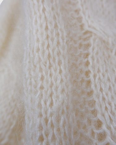 Slip into this cozy Premium Vintage 90s mohair superkid mix cable knit cardigan! Soft, furry and light transparent with a unique twist on a classic style, this cardigan is a must-have for any cable knit lovers!