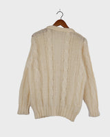 Slip into this cozy Premium Vintage 90s mohair superkid mix cable knit cardigan! Soft, furry and light transparent with a unique twist on a classic style, this cardigan is a must-have for any cable knit lovers!