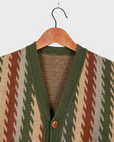 This vintage, 70s-inspired vest (thin) is a classic look you'll love! The earthy green and brown tones create an effortlessly cool look. Button up and feel the 70s vibes!