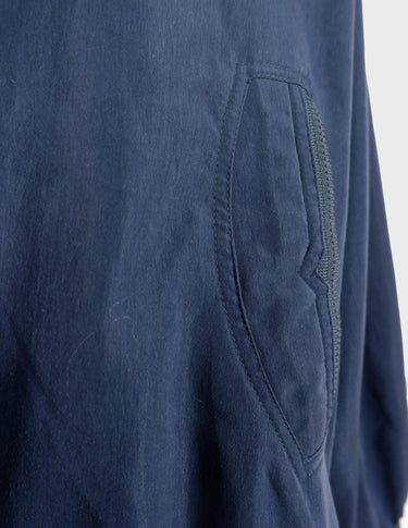 Channel your inner '90s cool kid in this stylish blue bomber jacket! Featuring a stitched logo and classic design, it'll give you the amazing look you crave!