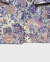 This floral lightweight cotton blazer screams vintage 80s vibes with its long silhouette and shoulder pads!