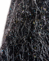 Add some retro sparkle to your wardrobe with this vintage 80s black glitter v-neck sweater. Who needs subtle when you can shine?!