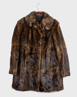 Introducing our Premium Vintage 70s brown real fur jacket, perfect for adding a touch of luxury to any outfit. Made from real fur, this jacket exudes a timeless elegance!