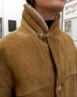 This jacket is an absolute classic! Stay warm in this vintage 80s brown and beige leather winter jacket. Perfect for any size between M - small L, you'll surely slay the day!