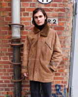Dip into the vintage look with this super-cozy shearling coat! This classic brown beauty is made for keeping you warm on the chilliest of days. Now you can look as warm as you feel!