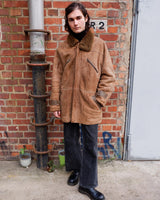 Dip into the vintage look with this super-cozy shearling coat! This classic brown beauty is made for keeping you warm on the chilliest of days. Now you can look as warm as you feel!