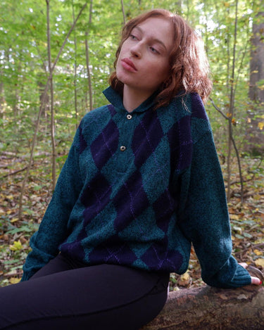 Stay cozy and classy in this vintage 90s green argyle sweater. Perfect for sizes M-L, this sweater features a classic argyle pattern and a pop of playful green