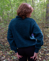 Stay cozy and classy in this vintage 90s green argyle sweater. Perfect for sizes M-L, this sweater features a classic argyle pattern and a pop of playful green