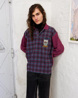 This vintage 80s checkered sweater is the comfiest way to stay warm this season! Cozy dark pink tones and a classic checkered pattern give you the perfect casual look. And don't worry about chill; it'll keep you toasty like a warm hug!