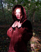 Get ready to slay in this vintage 80s hood coat! Made from brown-red leather and fake fur applications this coat is perfect for keeping you warm on those chilly days. 