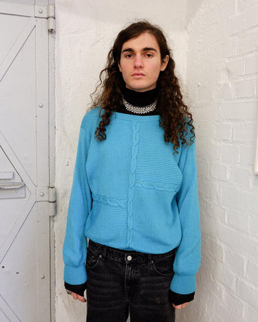 Experience true vintage luxury with the Premium Luisa Spagnoli 80s cable knit sweater. Crafted from premium lana wool, this cozy piece is a timeless classic that will keep you warm