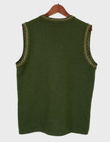 a woman is wearing a vintage 90s long green vest with golden details.